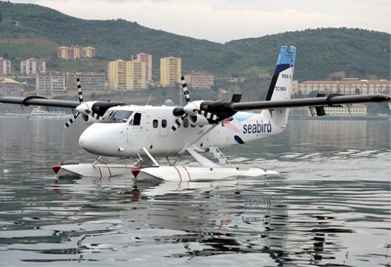 Gazeteciler deneme uçusuna katildi.